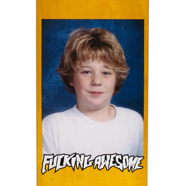 Modified Description: A photo of a young boy with a FUCKING AWESOME ANDERSON CLASS PHOTO photodebut pro board.