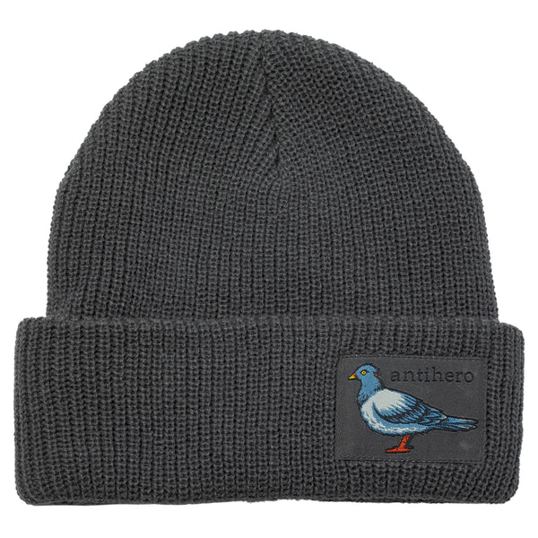 A grey beanie with a patch of a pigeon.