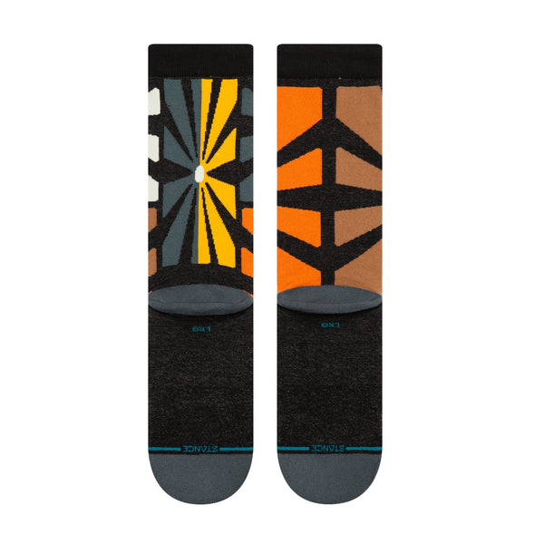 Multi-colored STANCE socks with an orange and black design.