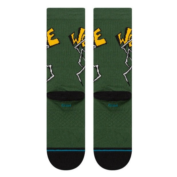 A pair of green socks with yellow and white characters by STANCE SOCKS X WELCOME SKATEBOARDS WILBUR LARGE.