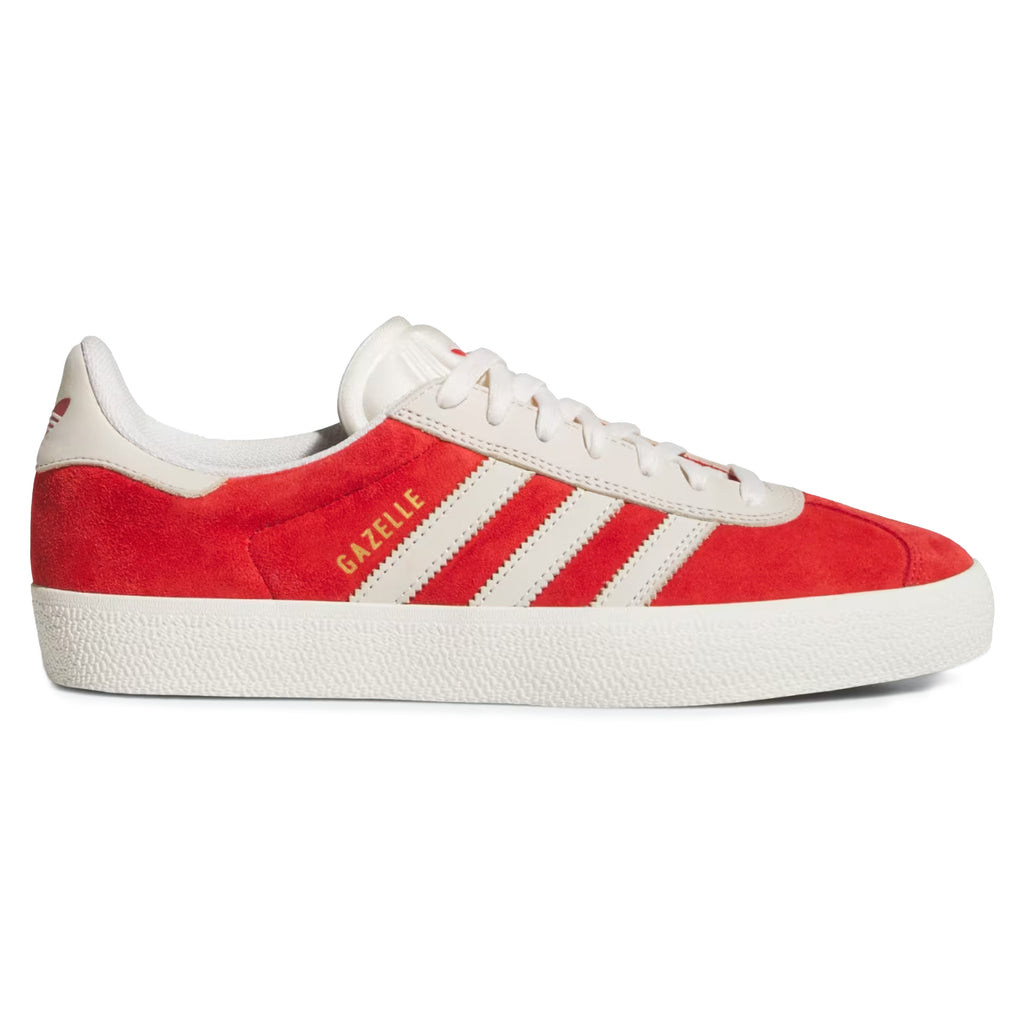 The Adidas Gazelle ADV in Better Scarlet and Chalk White boasts classic white laces and a textured sole, capturing the timeless style cherished by MNUFC fans.