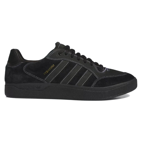 ADIDAS TYSHAWN LOW BLACK / WHITE / GOLD METALLIC sneaker with suede detailing and the brand's signature three stripes.