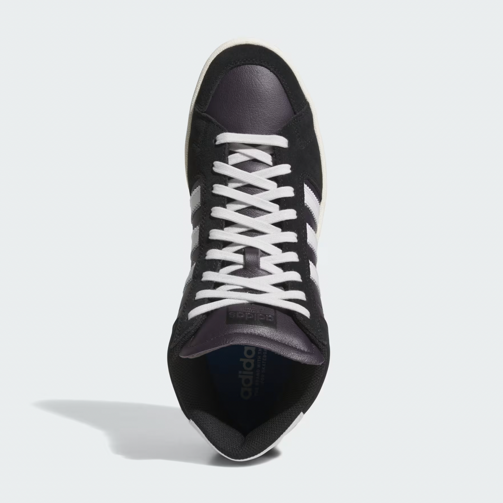 Top-down view of the ADIDAS SUPERSKATE ADV in Core Black, Crystal White, and Off White—suede upper, white laces, and signature white stripes. Classic ADIDAS skateboarding shoes shown against a light background.