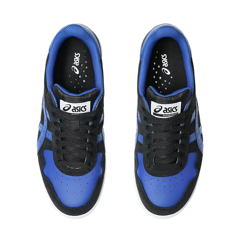 Top view of ASICS JAPAN PRO BLACK / BLUE sneakers, crafted with durable suede, black laces, and a white logo on the tongue.