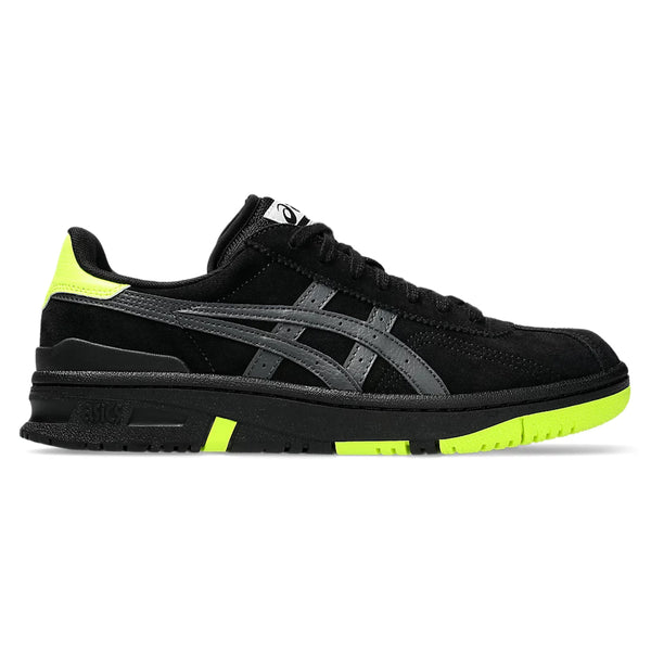Side view of a black ASICS VIC NBD sneaker with neon yellow accents on the sole and heel.
