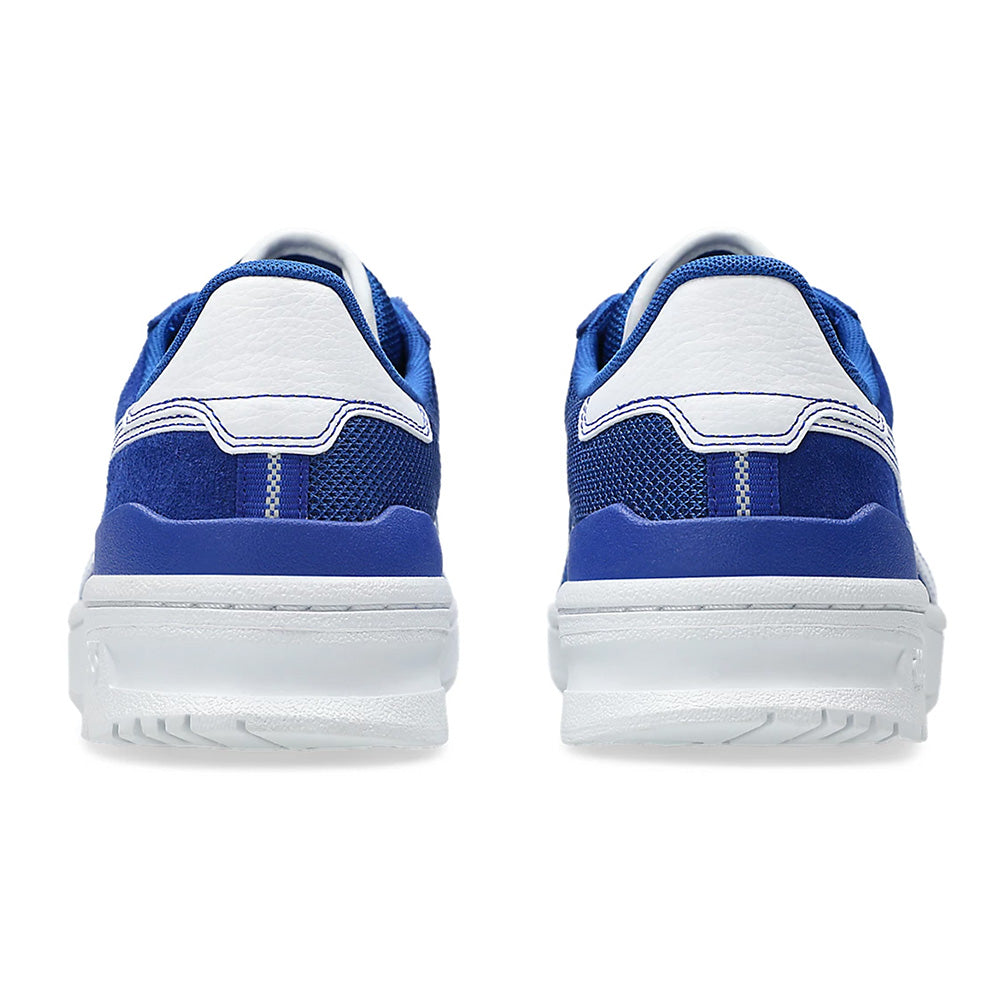 Back view of ASICS VIC NBD Clay Prussian Blue/White shoes, showcasing a textured heel design and white soles, crafted from mesh and suede for style and comfort.