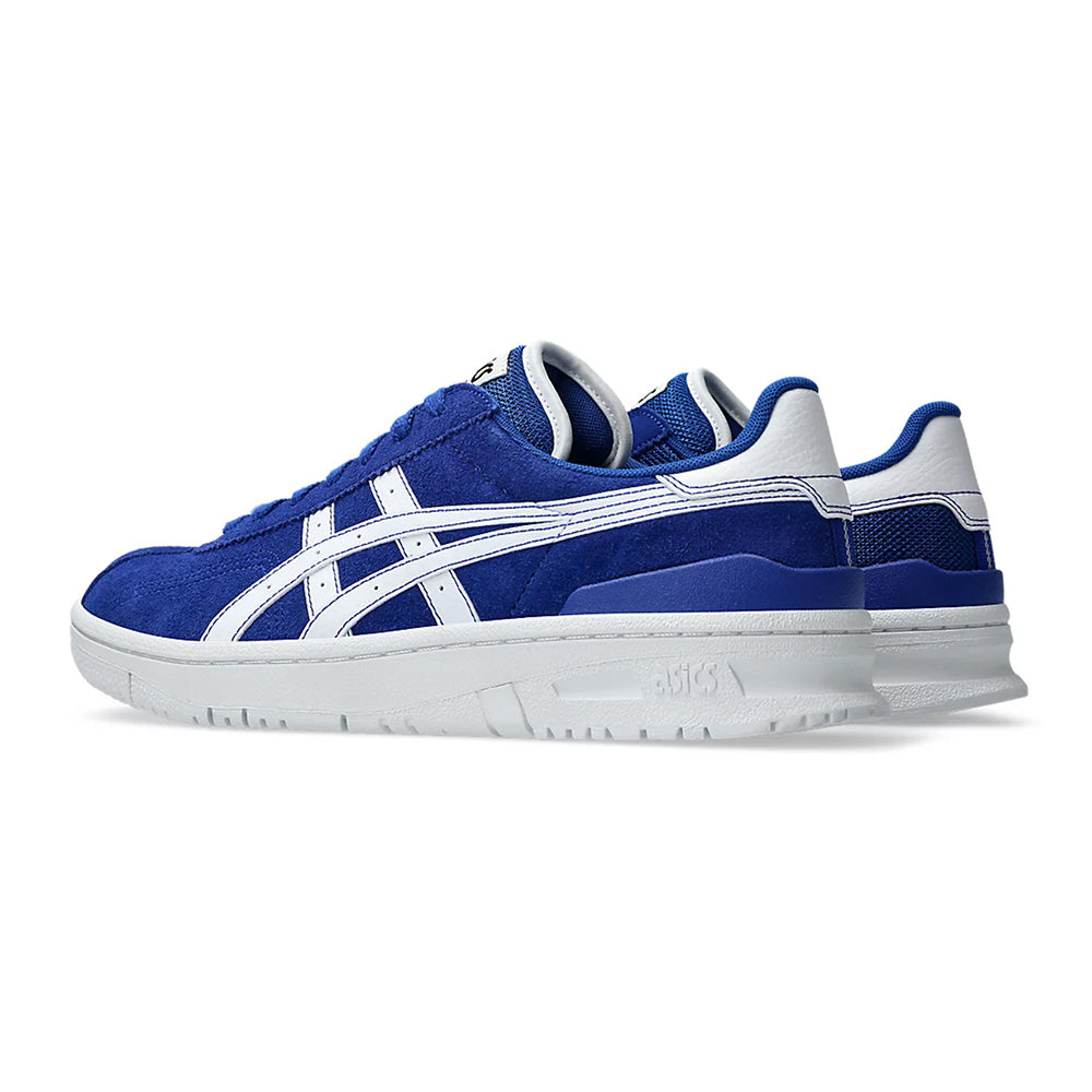 The ASICS VIC NBD CLAY sneakers in Prussian Blue/White feature a striped design, FF BLAST cushioning for comfort, a white sole, and a visible ASICS logo on the heel.