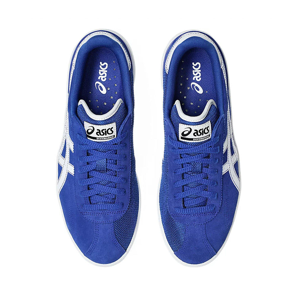 Top view of ASICS VIC NBD CLAY sneakers in Prussian Blue/White, featuring FF BLAST cushioning, white stripes and soles, visible branding on the tongue and lining, with a stylish mesh and suede texture.