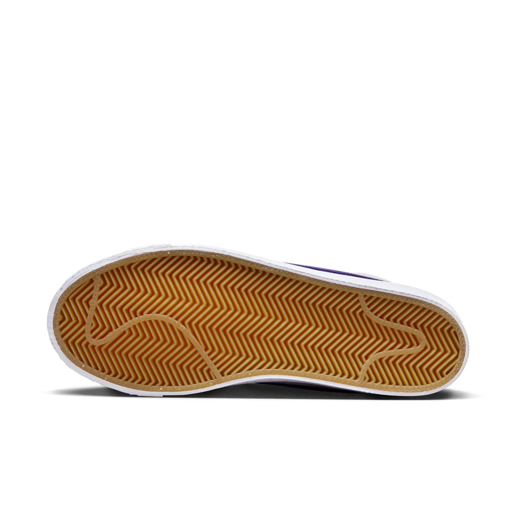 The bottom gum sole of the shoe.