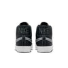 A pair of black and white Nike SB Blazer Mid X Mason Silva Blacked Blue / Wolf Grey sneakers.