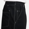 The back pocket of a durable man's NIKE SB DOUBLE KNEE SKATE PANTS BLACK.