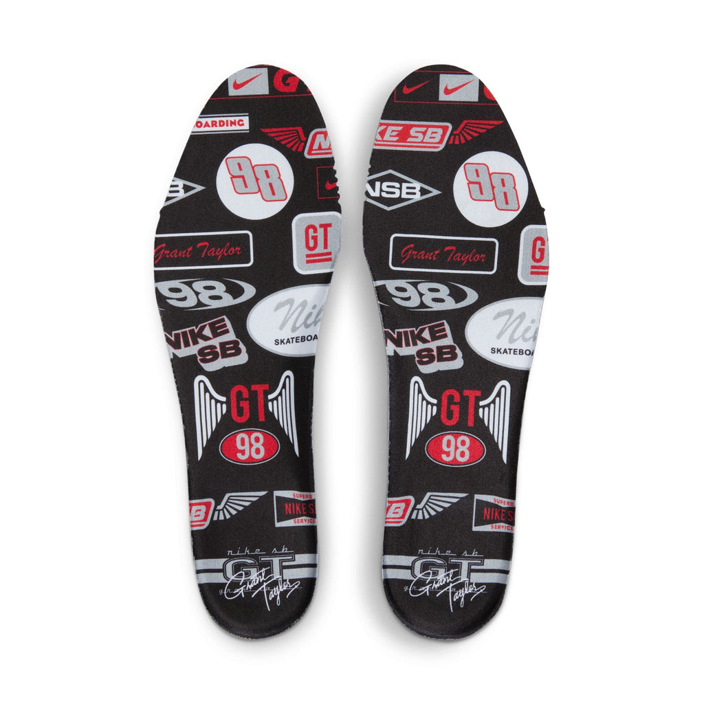 A pair of black and white NIKE SB BLAZER MID PRO GT BLACK / METALLIC SILVER insoles with logos on them, perfect for Nike Zoom Blazer skateboard enthusiasts and fans of Grant Taylor.
