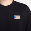 Close-up of a black Men's Skate T-Shirt with a colorful Nike SB logo on the chest.  NIKE SB FORCAST SKATE TEE BLACK by nike.