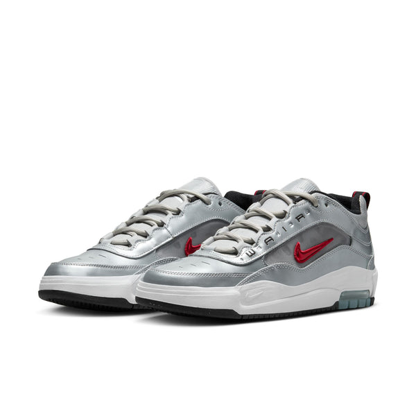 The NIKE SB ISHOD 2 AIR MAX sneakers combine a metallic silver and gray design with a varsity red swoosh, white laces, a unique black and white sole, and visible green air cushioning for style and comfort.