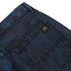 A pair of DICKIES TOM KNOX LOOSE DENIM JEANS DEEP BLUE with a pocket on the back.