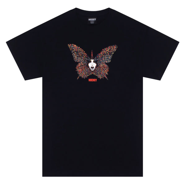 A black t-shirt with a butterfly design with a face in the middle on it.