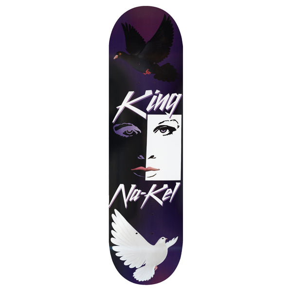 Skateboard deck featuring a graphic design with a portrait of a face, the text "KING TYSHAWN SNOOPY," and images of a black and a white dove. 
becomes
Skateboard deck featuring the KING NA-KEL DOVES design by King.