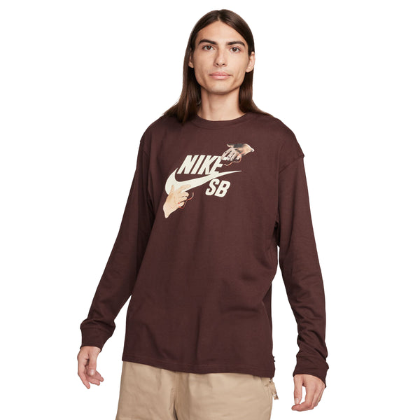 Man in a long-sleeve nike 'City of Love' LS skate tee standing against a neutral background.