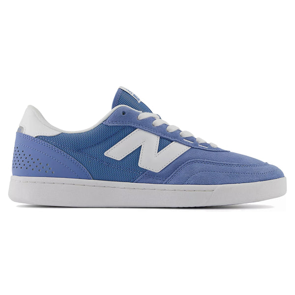 Blue and white NB Numeric 440 V2 sneaker against a white background.