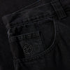 A pair of high waisted, cotton-denim fabric POLAR black jeans with a POLAR logo on the pocket.