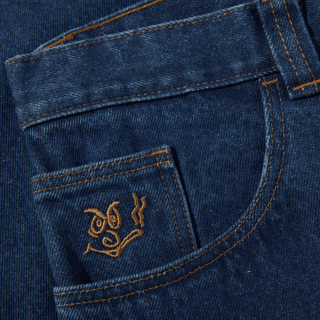 A pair of POLAR '92! DENIM DARK BLUE jeans with an embroidered pocket.