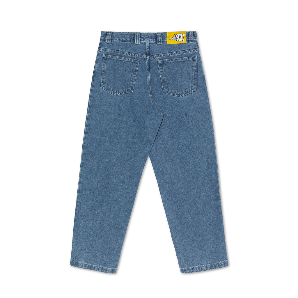 A pair of POLAR '93! DENIM MID BLUE jeans with a yellow label.