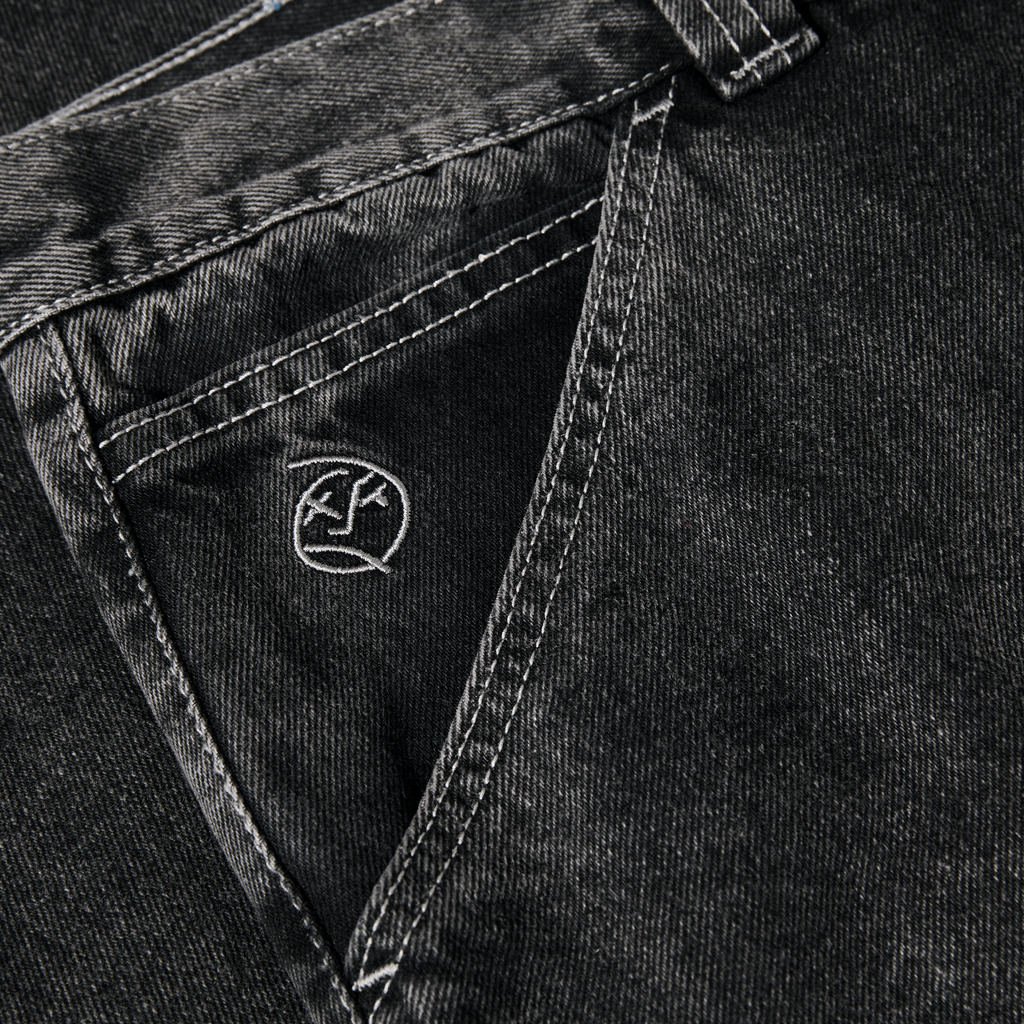 Close-up of a POLAR BIG BOY DOUBLE KNEE WORK PANT with intricate stitching and a small logo embroidered on a pocket.
