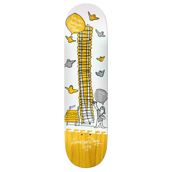 A SKATESHOP DAY 2024 SHOP KEEPER skateboard deck featuring a drawing of a building and birds, available at a DELUXE skateshop.