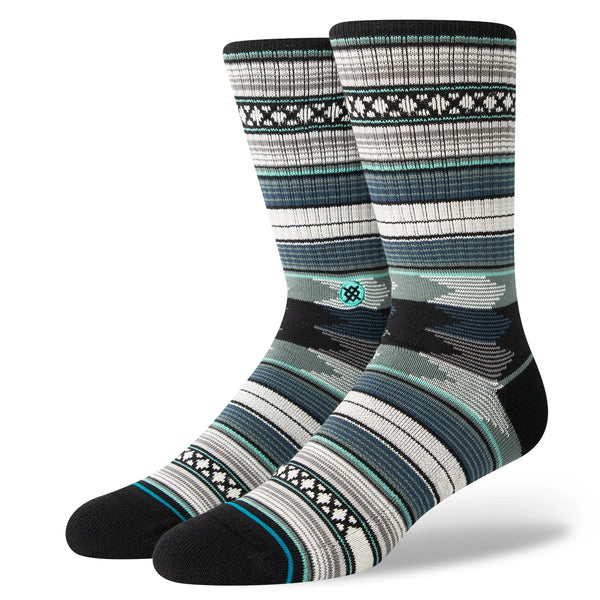 A pair of STANCE SOCKS BARON JADE LARGE with a striped pattern.