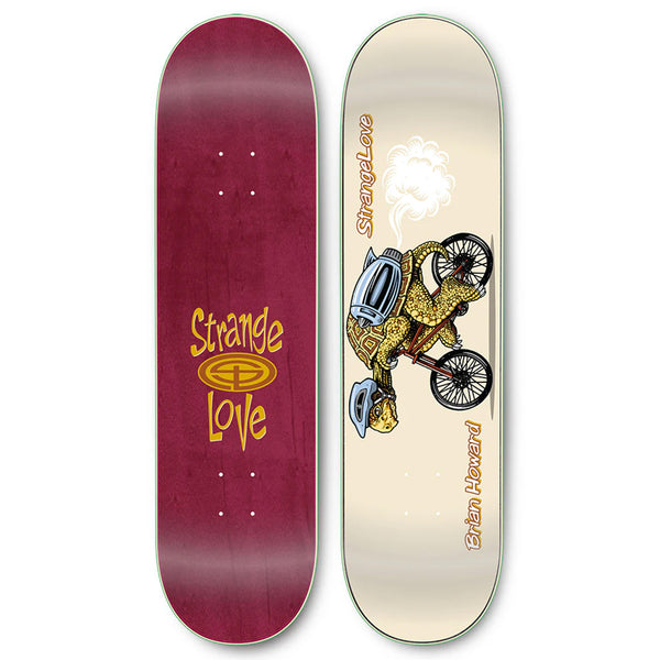 Two skateboards; one with a maroon top and a gold logo saying "STRANGE LOVE", the other, designed by Sean Cliver, features an illustration of a skeleton riding a bike on a STRANGE LOVE BRIAN HOWARD.
