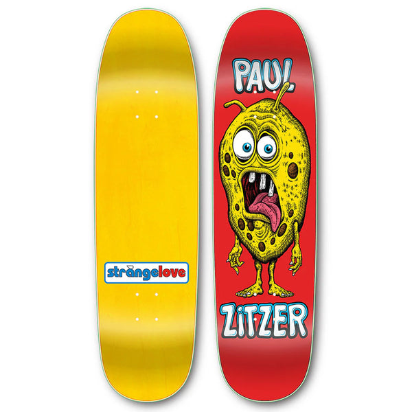 Two STRANGE LOVE PAUL ZITZER HAND SCREENED skateboard decks side by side; the left is plain yellow with a "strangelove" logo designed by Sean Cliver, and the right features a colorful cartoon monster with the text "pay!