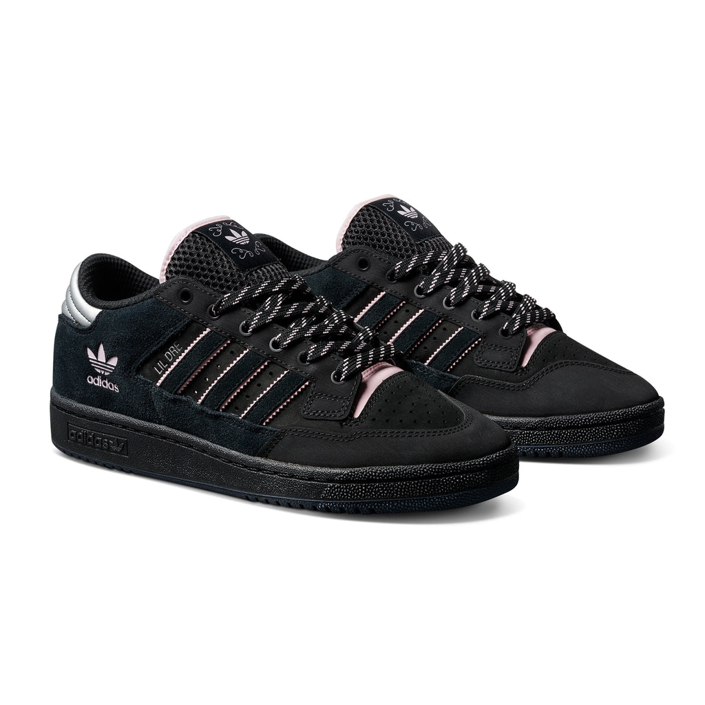 A pair of black ADIDAS CENTENNIAL 85 LO ADV X LIL DRE skateboarding shoes with pink accents and white branding, arranged side by side on a white background.