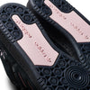 Close-up of black ADIDAS CENTENNIAL 85 LO ADV X LIL DRE slide sandals with a textured sole and a pink adidas logo on the strap.