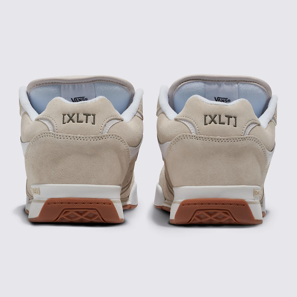 Rear view of two beige Vans ROWLEY XLT UTILITY RAINY DAY skateboarding sneakers showing the duracap heel label and waffle outsoles.