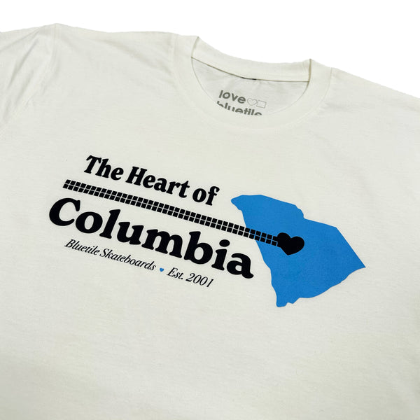 The BLUETILE HEART OF COLUMBIA TEE NATURAL, featuring a Bluetile Skateboards logo, is the heart of skateboarding fashion.
