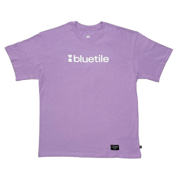 Lavender BLUETILE PUFF LOGO TEE LILAC t-shirt by Bluetile Skateboards printed on the front.