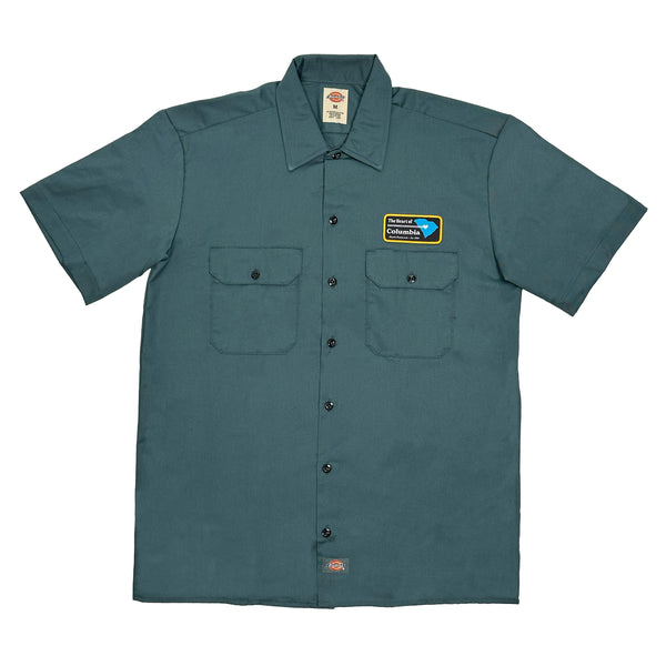 A BLUETILE Skateboards "Heart of Columbia" work shirt in Lincoln Green, with a regular fit.