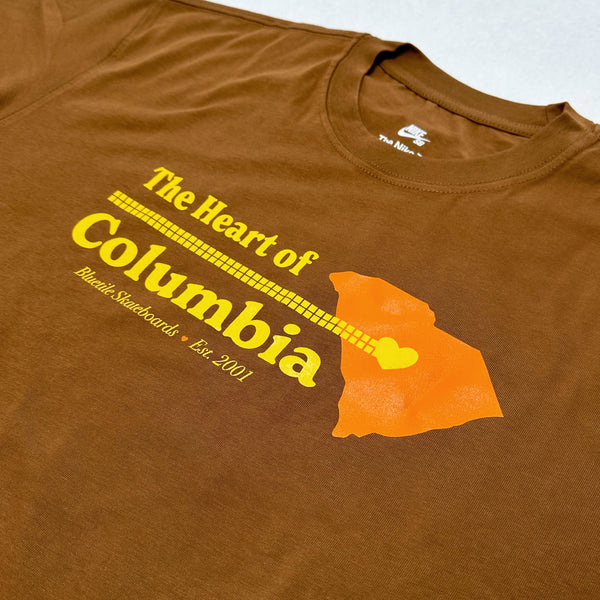 BLUETILE HEART OF COLUMBIA TEE BRITISH TAN by Bluetile Skateboards with a graphic of a heart-shaped guitar on a map silhouette is now available.