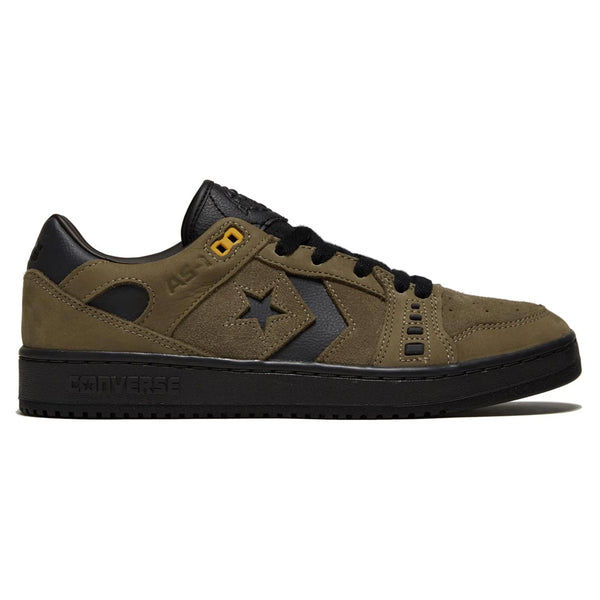 Side view of a dark olive CONVERSE CONS ALEXIS AS-1 PRO GREEN / ALMOST BLACK sneaker with star logo, featuring black soles and yellow detailing.