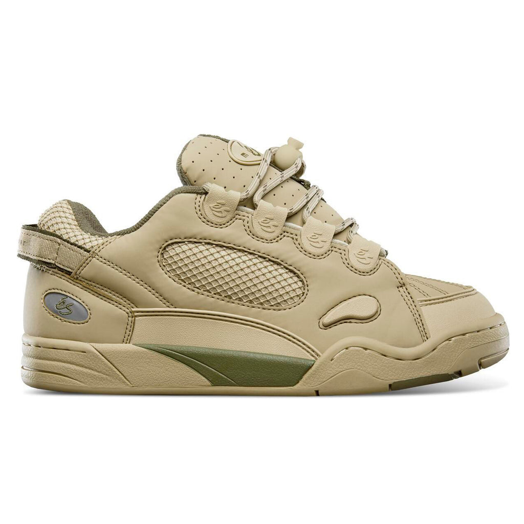 A limited edition beige sneaker with green accents and velcro strap, designed by ES Muska for skateboard enthusiasts.
