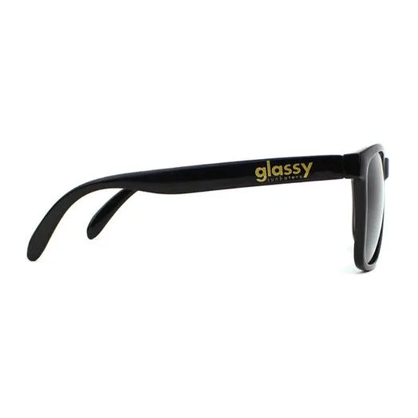 Black GLASSY DERIC polarized sunglasses with the word "glassy" on the side arm, isolated on a white background.