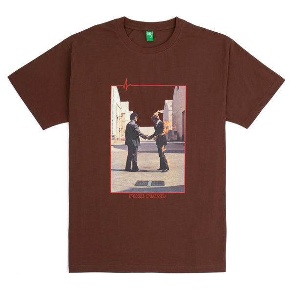 HABITAT X PINK FLOYD WISH YOU WERE HERE TEE BROWN from HABITAT featuring an image of two men shaking hands, with one man on fire. The text "Pink Floyd" is printed below the image. This premium brown shirt is inspired by the iconic album "Wish You Were Here.