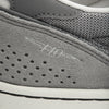 Close-up of a NB NUMERIC x VU 440 V2 GREY / ORANGE skate shoe showing detailed texture and the number 740 embossed on the side.
