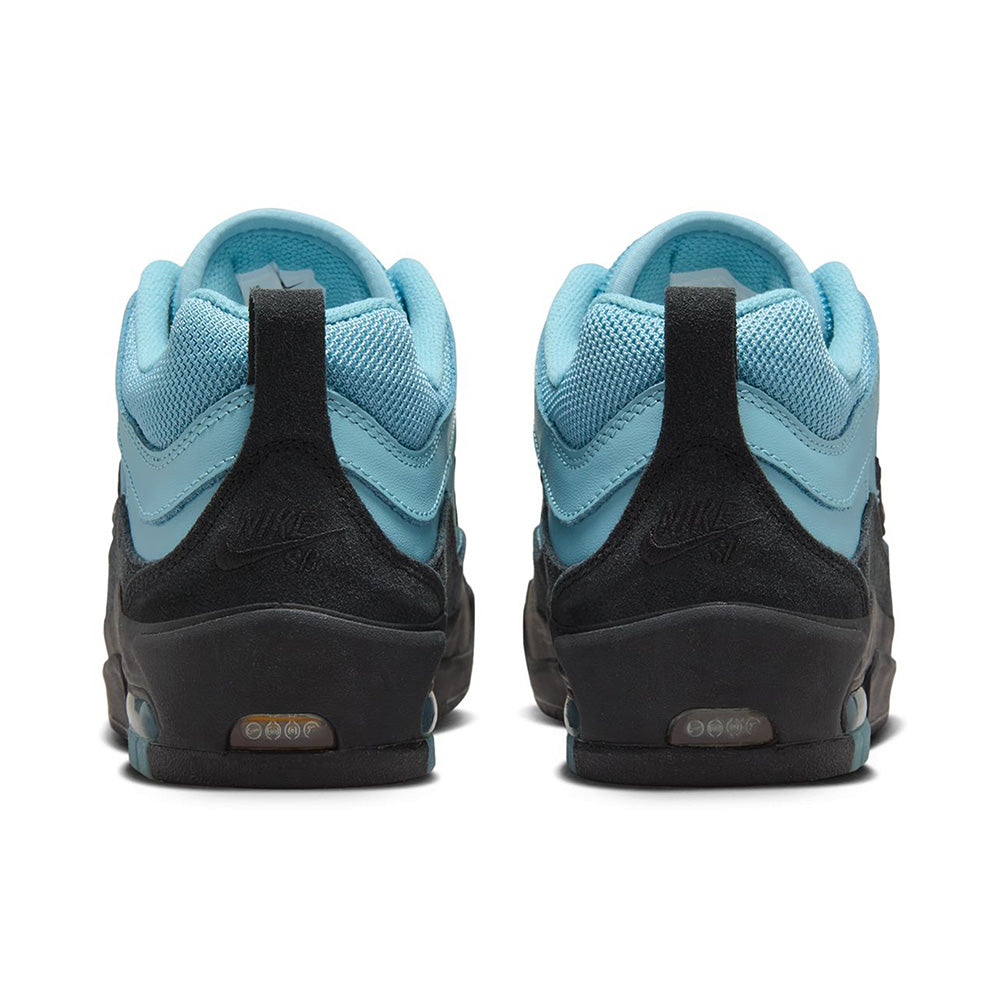 Rear view of a pair of sneakers with black and turquoise color blocks, featuring textured soles and visible logos, reminiscent of the NIKE SB ISHOD 2 AIR MAX DENIM TURQ / BLACK design by Nike.