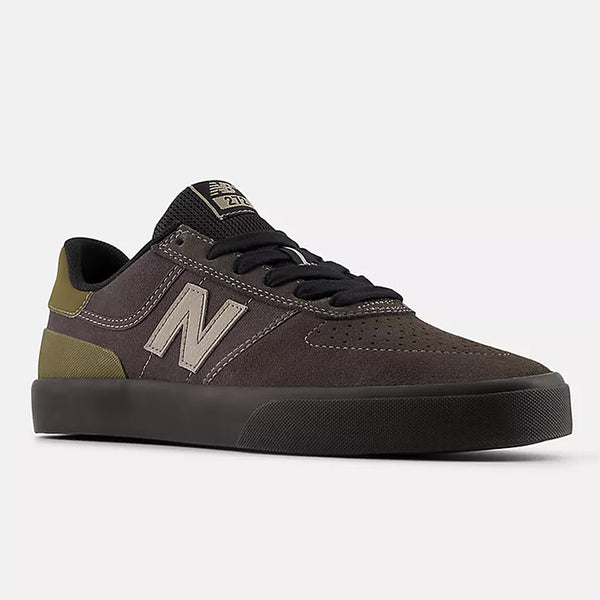 The NB NUMERIC 272 BLACK CEMENT / DOCKSIDE sneaker features a black and olive suede upper, black laces, and a flat vulcanized sole for great board feel, shown against a plain white background.