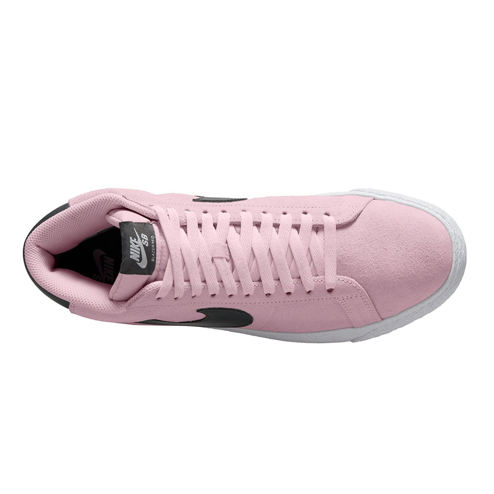 Top view of the NIKE SB BLAZER MID PINK FOAM/ANTHRACITE-WHITE-GUM YELLOW by Nike, featuring a pink upper, white sole, black swoosh, white laces, and Zoom Air cushioning—stylish and comfortable for skateboarding.