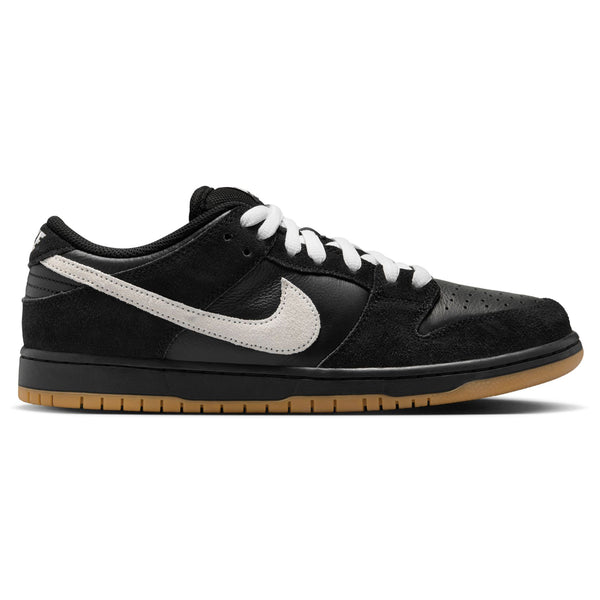 Introducing the NIKE SB DUNK LOW PRO BLACK / WHITE-BLACK-GUM LIGHT BROWN—a sleek black and gray low-top sneaker with a white swoosh and laces. It features a stylish suede upper and a durable brown rubber outsole for enhanced traction and longevity.