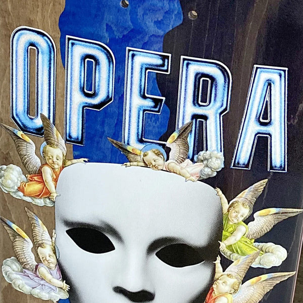 A collage featuring a white OPERA EXIT mask in the foreground with the word "opera" in bold letters and cherubs flying around it, crafted on North American Maple.