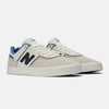A pair of new NB Numeric FOY 306 Sea Salt / Timberwolf sneakers, designed as a vulcanized skate shoe.