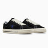 Converse x Quarter Snacks One Star Pro in black with a touch of Snake-skin for a unique look.